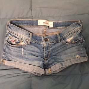 Hollister medium wash distressed denim shorts